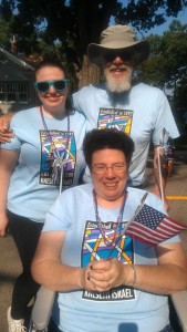 The Energizer Rabbi in her borrowed, decorated wheelchair and her family